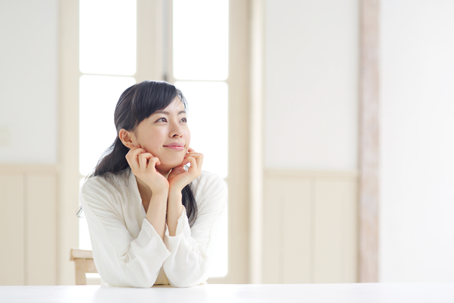 Comfortable woman enjoying air conditioning